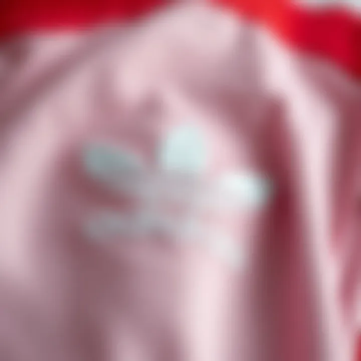 Close-up of the Adidas Big Trefoil logo on fabric