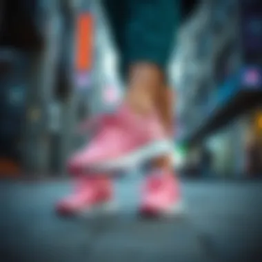 Woman wearing pink sports shoes in an urban setting