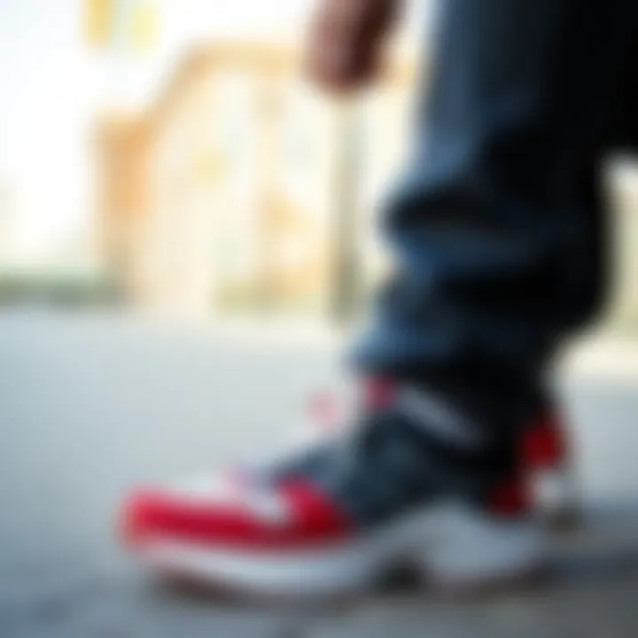 An individual wearing athletic shoes paired with stylish attire.