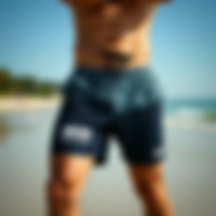 Stylish Helly Hansen swim shorts on a beach