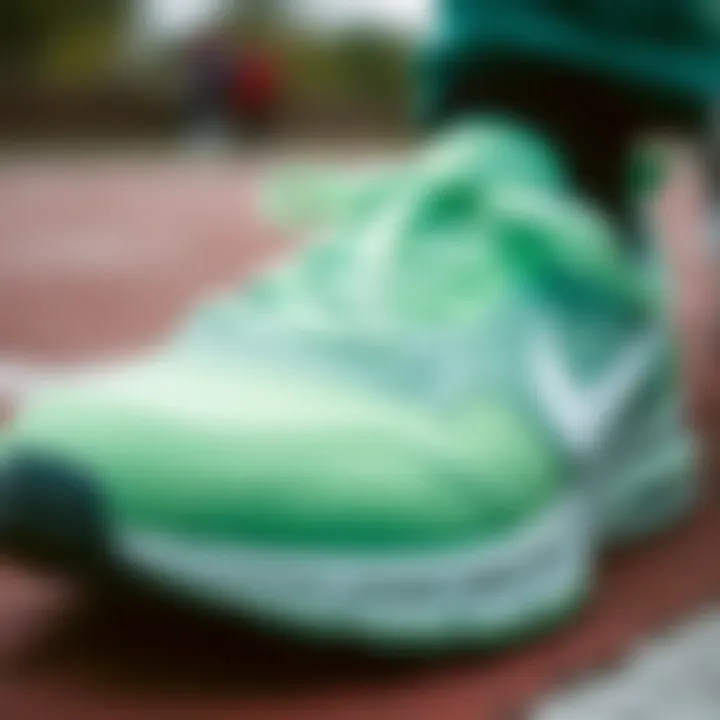 Close-up of the unique design elements of Nike green footwear