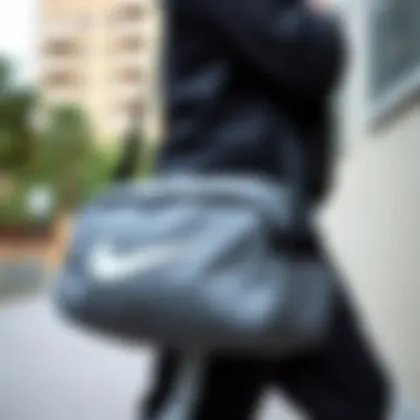 Nike grey bag paired with sportswear