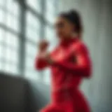 Dynamic pose showcasing the Nike red tech apparel during a workout session
