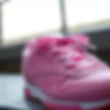 Close-up of Reebok pink shoes showcasing material quality