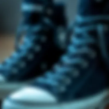 A close-up of black high-top Converse showcasing material quality